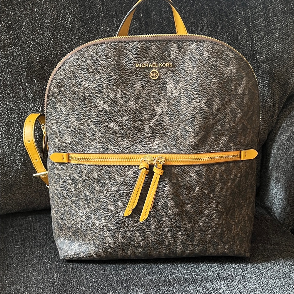 Michael Kors signature backpack with marigold leather trim EUC